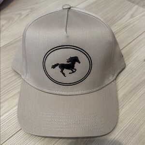 Beige Cap with Black Horse Emblem